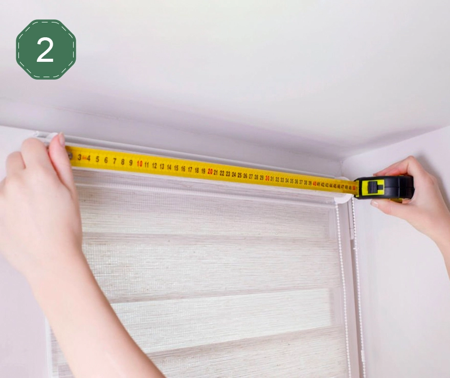 image of a couple measuring for curtain and blinds